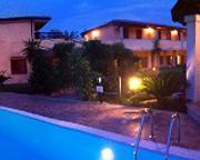 Fenicottero Rosa Hotel Porto Taverna Buitenkant foto
